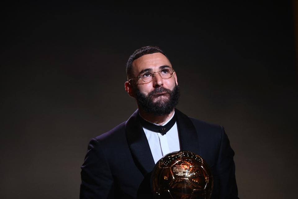 Real Madrid's French forward Karim Benzema (pictured) looks up after winning the Ballon d'Or.