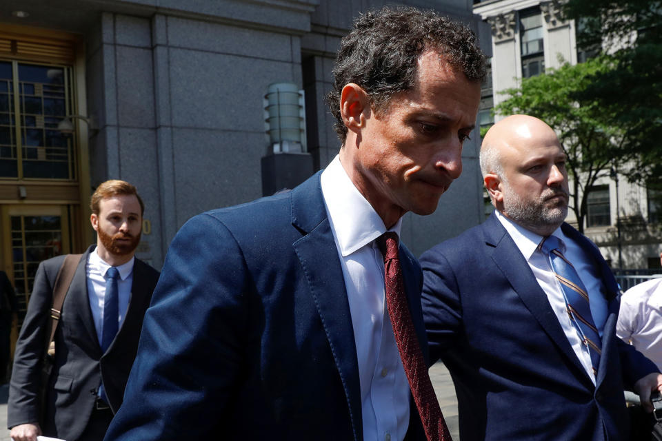 <p>Former U.S. Congressman Anthony Weiner exits U.S. Federal Court with attorney Arlo Devlin-Brown (R) in New York City, May 19, 2017, after pleading guilty to one count of sending obscene messages to a minor, ending an investigation into a “sexting” scandal that played a role in last year’s U.S. presidential election. (Photo: Brendan McDermid/Reuters) </p>