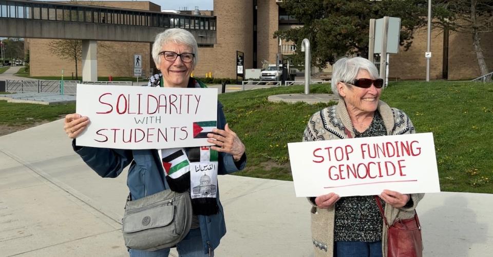 Two other protesters at Wednesday's rally. 