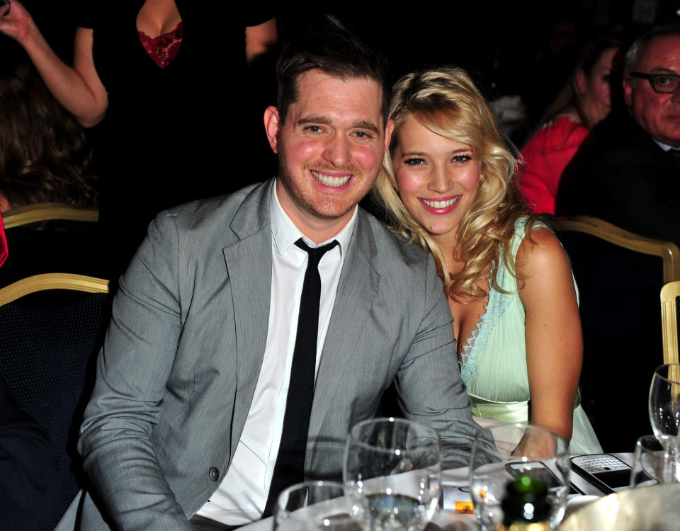FILE - In this June 29, 2012 file photo, singer Michael Buble and his wife, Argentine TV actress Luisana Lopilato, pose at the Nordoff Robbins 02 Silver Clef Awards at London Hilton, in London. His new album, “To Be Loved,” will be released April 23 and includes a tribute to his wife. They announced in January their expecting their first child. (Photo by Jon Furniss/Invision/AP, File)