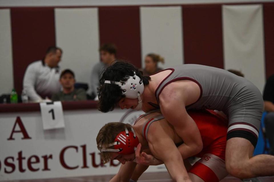 State College’s James Whitbred controls Punxsutawney’s Jordan Rutan in their 133 pound PIAA Class 3A Northwest Regional final on Saturday, Feb. 24, 2024 in Altoona. Whitbred beat Rutan, 9-3, for his first regional crown.