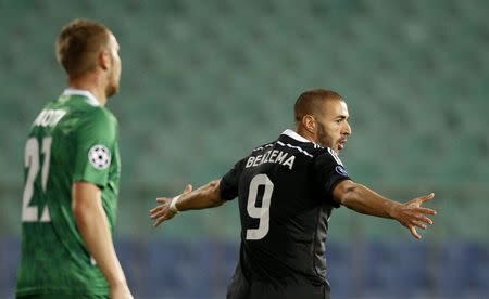 Karim Benzema of Real Madrid celebrates his goal during their Champions League Group B soccer match against Ludogorets at Vassil Levski stadium in Sofia October 1, 2014. REUTERS/Stoyan Nenov