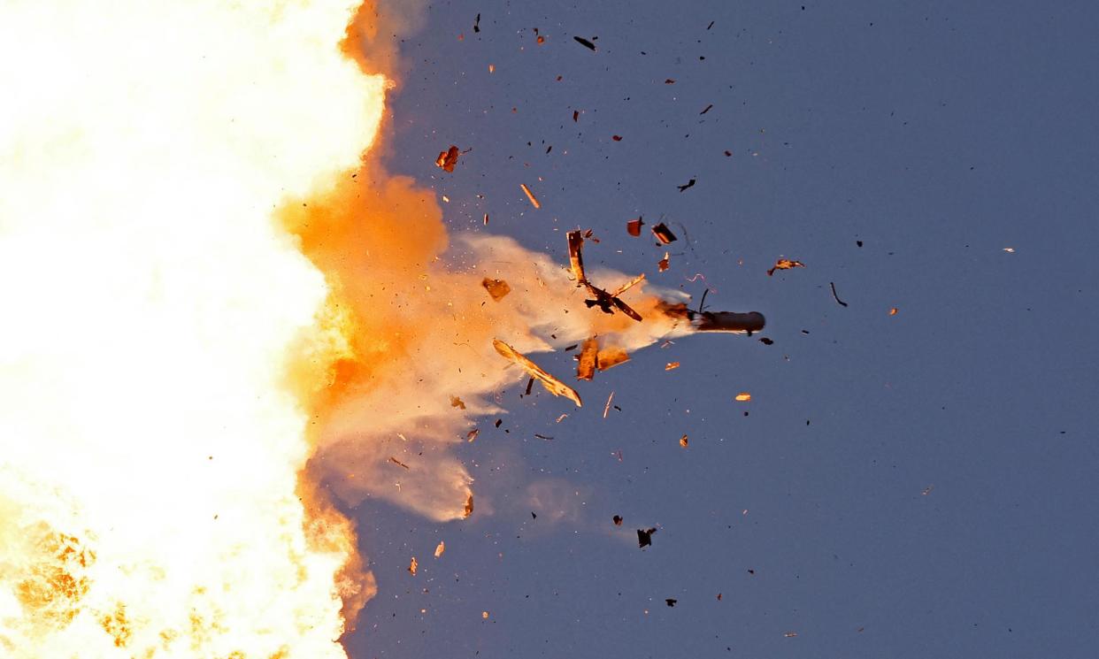 <span>A Hezbollah drone is destroyed by Israeli air forces in the skies over northern Israel.</span><span>Photograph: Jalaa Marey/AFP/Getty Images</span>