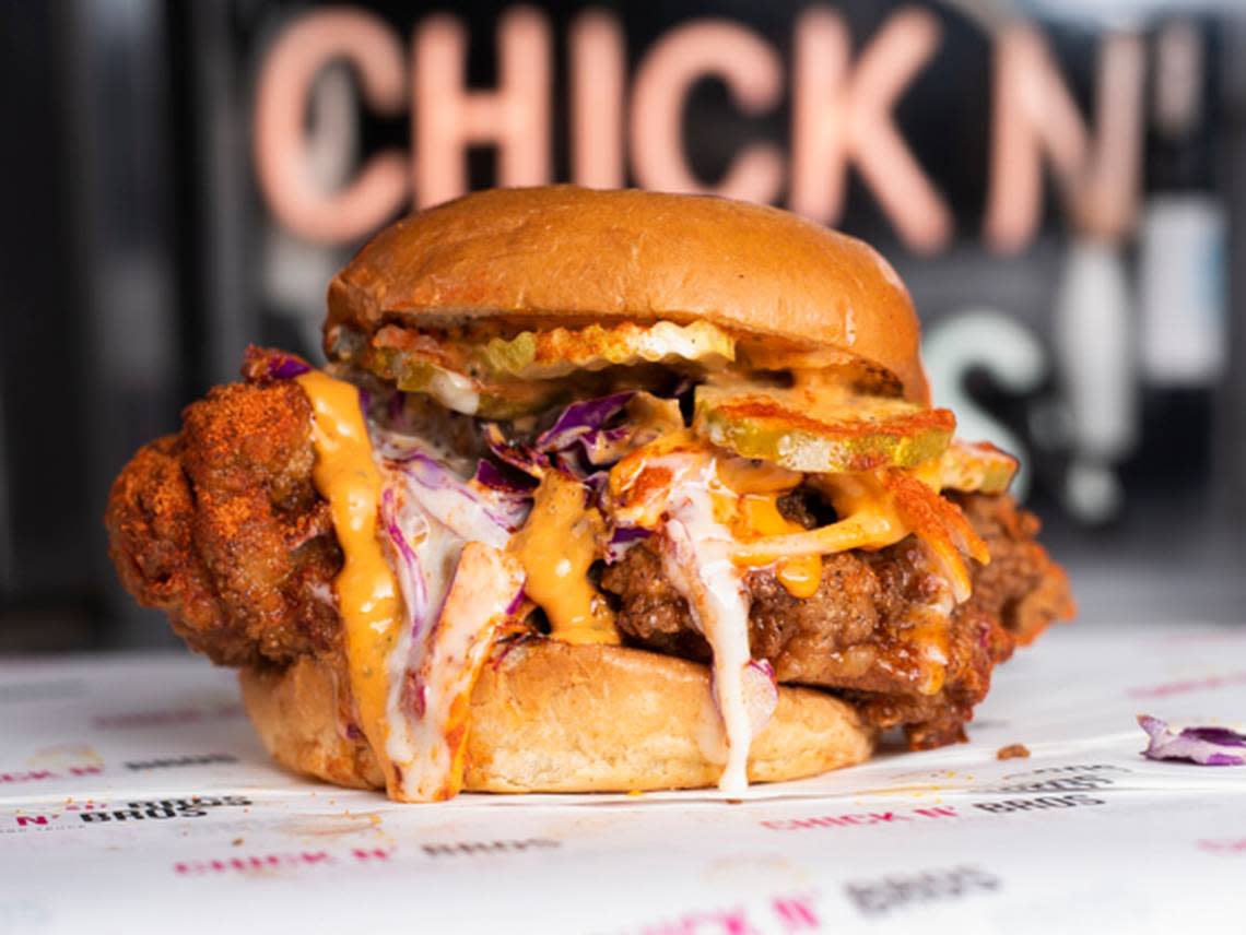 The Nashville Fire sandwich at CHICK N’ BROS comes with spicy adobo aioli “bro sauce,” sweet and tangy “chick sauce,” onion, pickle, purple cabbage, cayenne pepper, paprika and honey.