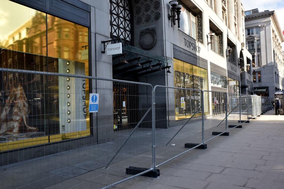 london, united kingdom   february 12, 2021   topshop is now part of asos, the oxford street flagship store is now fenced off and being emptied