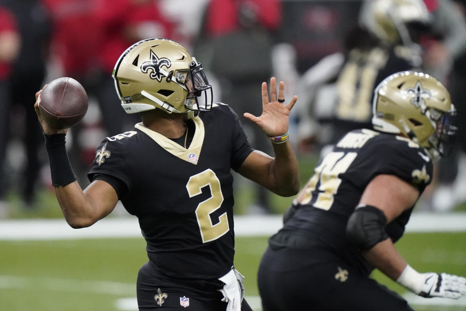 New Orleans Saints quarterback Jameis Winston (2) works in the pocket against the Tampa Bay Buccaneers during the first half of an NFL divisional round playoff football game, Sunday, Jan. 17, 2021, in New Orleans. (AP Photo/Brynn Anderson)