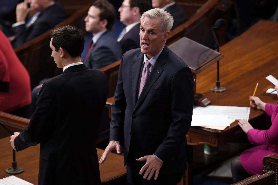 Rep. Kevin McCarthy emphatically gestures downward, mouth agape, indicating that he has had enough.