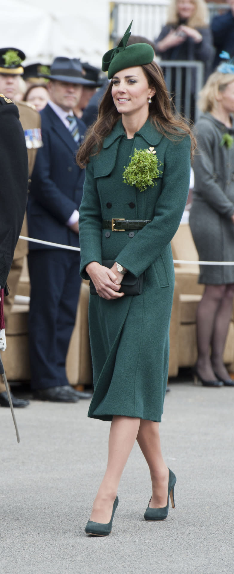 <p>For 2014’s St. Patrick’s Day ceremonies, Kate opted for a suitably green look by Hobbs. She accessorised with a green Gina Foster hat and suede shoes by Emmy London. </p><p><i>[Photo: PA]</i></p>