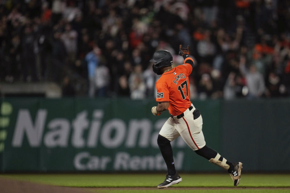 San Francisco Giants' Heliot Ramos runs the bases after hitting a three-run home run against the Los Angeles Angels during the eighth inning of a baseball game Friday, June 14, 2024, in San Francisco. (AP Photo/Godofredo A. Vásquez)