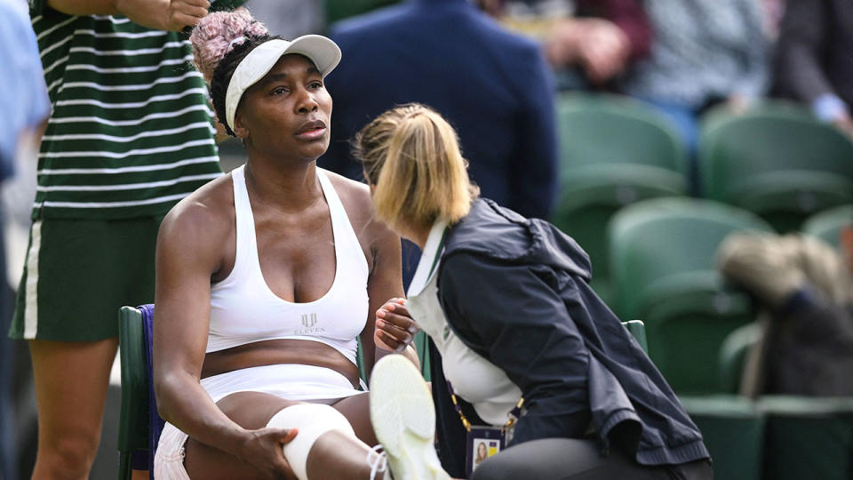 Pictured here, Venus Williams receives treatment on her troublesome right leg at Wimbledon. 