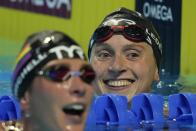 Katie Ledecky smiles after winning the women's 1500 freestyle during wave 2 of the U.S. Olympic Swim Trials on Wednesday, June 16, 2021, in Omaha, Neb. (AP Photo/Charlie Neibergall)