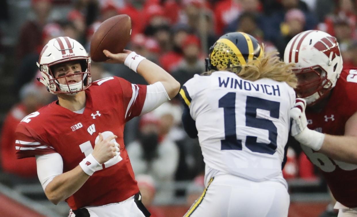 Wisconsin’s Alex Hornibrook throws during the first half of an NCAA college football game against Michigan Saturday, Nov. 18, 2017, in Madison, Wis. (AP Photo/Morry Gash)