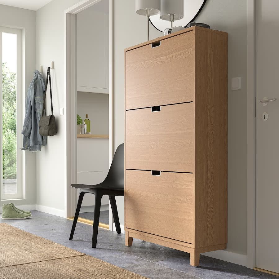 <p><a href="https://www.ikea.com/us/en/p/staell-shoe-cabinet-with-3-compartments-oak-veneer-00530226/" rel="nofollow noopener" target="_blank" data-ylk="slk:Shop Now;elm:context_link;itc:0;sec:content-canvas" class="link ">Shop Now</a></p><p>Ikea</p><p>ikea.com</p>