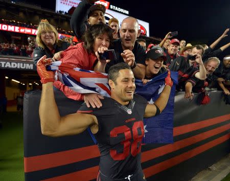 San Francisco 49ers running back Jarryd Hayne (38) poses with an Australian flag after the game against the Minnesota Vikings at Levi's Stadium. Sep 14, 2015; Santa Clara, CA, USA. Kirby Lee-USA TODAY Sports