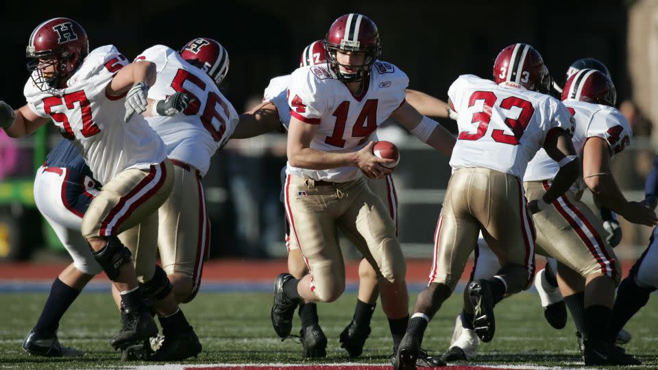 Fitzpatrick (No. 14) in action for the Harvard Crimson against the Penn Quakers in 2004. - Chuck Solomon/Sports Illustrated/Getty Images