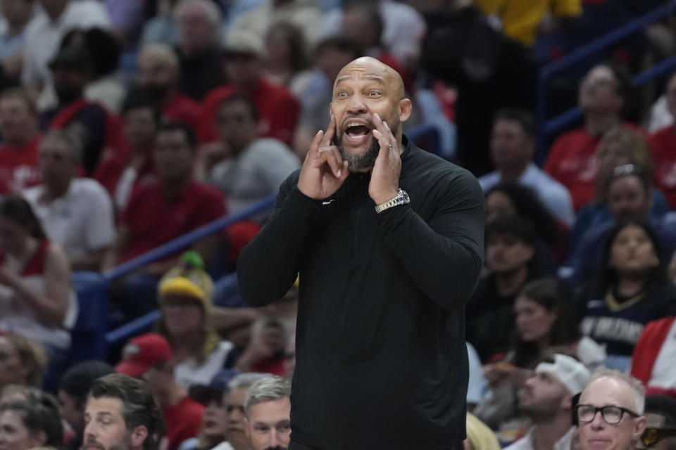 Los Angeles Lakers head coach Darvin Ham calls out from the bench in the second half of an NBA basketball play-in tournament game against the New Orleans Pelicans Tuesday, April 16, 2024, in New Orleans. The Lakers won 110-106. (AP Photo/Gerald Herbert)