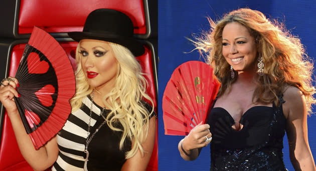 <b>Fan Moment</b>: Mariah Carey was definitely stepping into Christina Aguilera's diva territory when she flashed a hand fan at the NFL Kickoff Concert in 2012. Getting ready for the judging panel?