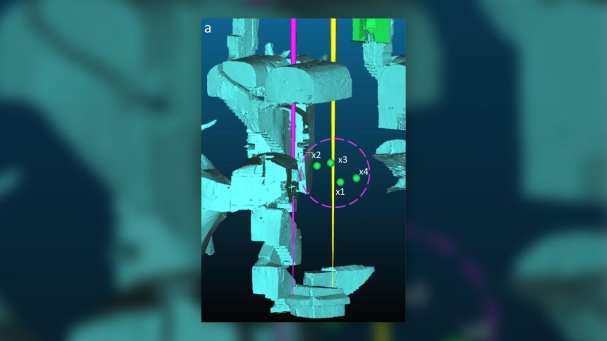  A 3D digital view of underground tunnels and burials, with the new finds shown as green spheres. 