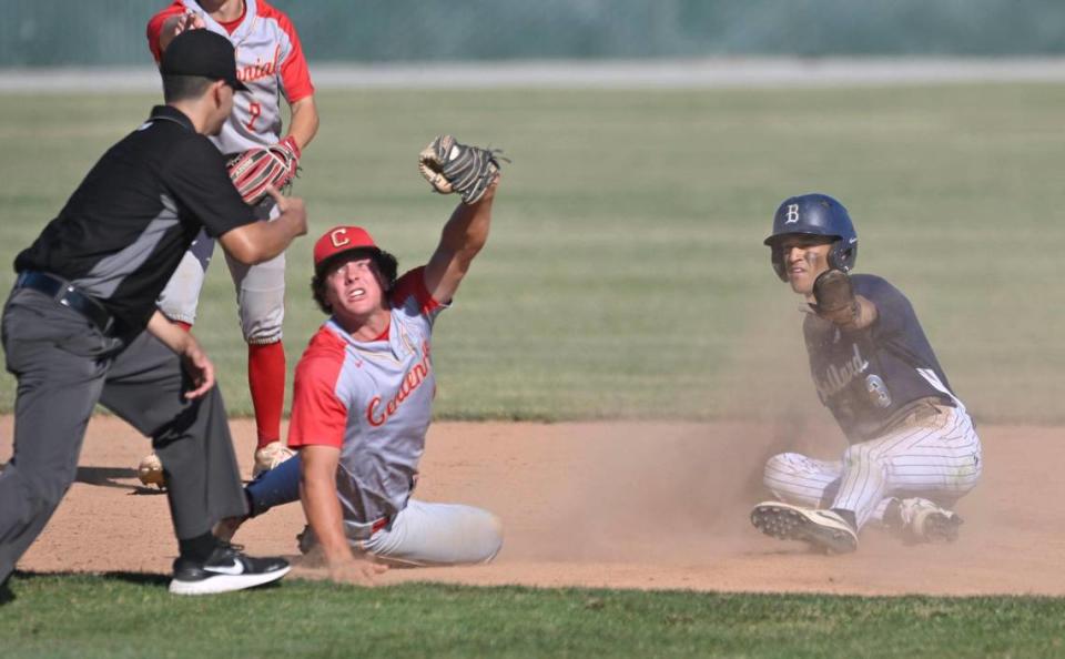 Centennial’s Brady Self, center, looks to the referee after making the play at second against Bullard’s Keynen Gomez, right, in the Central Section DI baseball quarterfinal Friday, May 19, 2023 in Fresno. Centennial won 6-2.