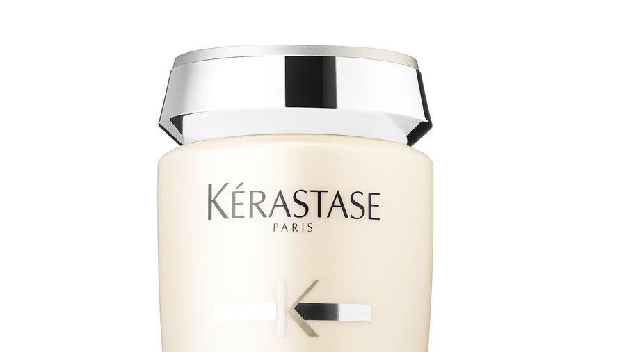 A bottle of Kérastase Densifique Bodifying Shampoo