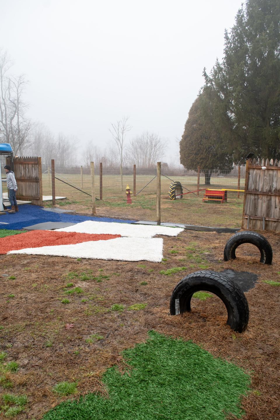 Two of the three enclosed play and training areas at Oakley's Adventures 101, LLC.