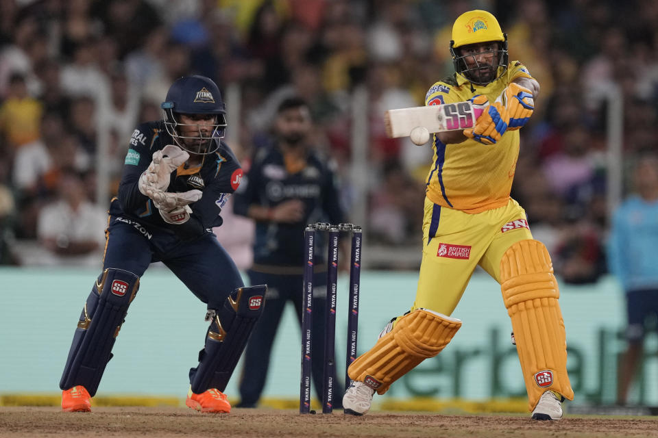 Chennai Super Kings' Ambati Rayudu, right, plays a shot during the Indian Premier League final cricket match between Chennai Super Kings and Gujarat Titans in Ahmedabad, India, Monday, May 29, 2023. (AP Photo/Ajit Solanki)