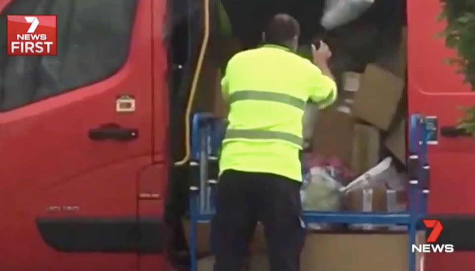 On Monday vision emerged of an Australia Post worker carelessly tossing parcels into a van. Source 7 News