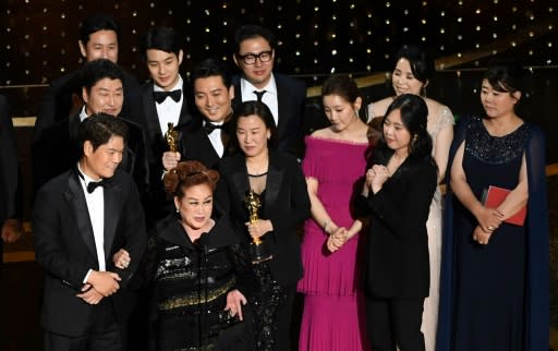 The unprecedented Oscars haul for 'Parasite' is the culmination of a corporate push into Hollywood that Miky Lee (2nd L front) has spearheaded for years