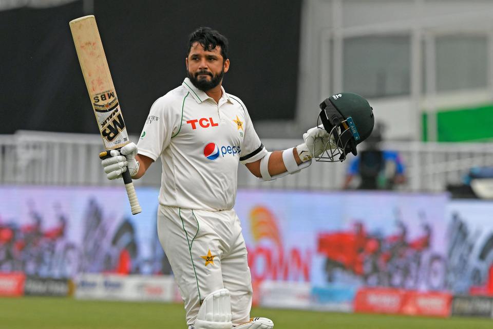 Seen here, Pakistan's Azhar Ali raises his bat after his dismissal for 184 runs in the first Test against Australia. 