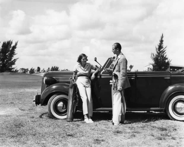 1930s golfing couple<p>Photo: H. Armstrong Roberts/ClassicStock/Getty Images</p>