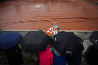 Rain suspended first round matches at the French Open tennis tournament in Roland Garros stadium in Paris, France, Monday, May 23, 2022. (AP Photo/Christophe Ena)