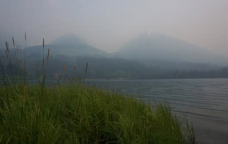 Smoke shrouds Summit Lake with a thick blanket of smoke from the Swan Lake Fire on Kenai Peninsula