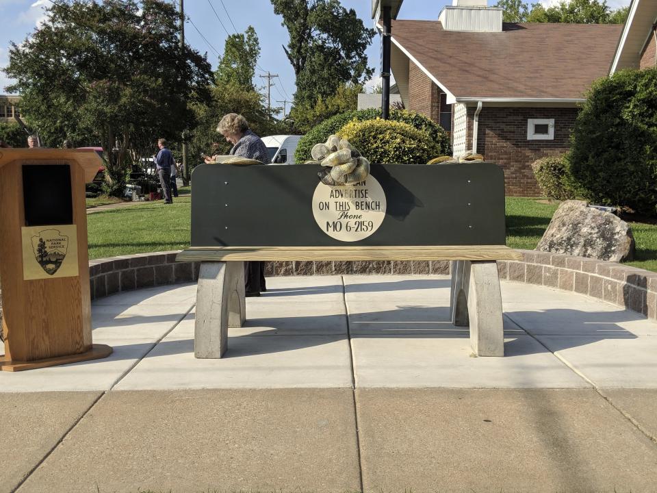 A reconstructed bench commemorates the original to which Elizabeth Eckford, one of the Little Rock Nine black students who first integrated Central High School in Little Rock, Ark., escaped from a crowd of white protesters, seen on Tuesday, Sept. 4, 2018. Eckford returned to the bench 61 years to the day later after walking a portion of the two blocks she originally walked in 1957. Current Central high students led the bench construction effort as part of the Central High Civil Rights Memory Project. (AP Photo/Hannah Grabenstein)