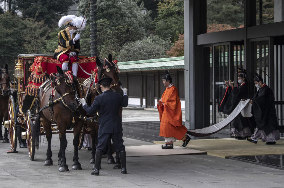 Japanese Crown Prince Fumihito, better known as Prince Akishino, leaves the Imperial Palace after being formally declared first in line to succeed the Chrysanthemum Throne during a ceremony Sunday, Nov. 8, 2020 in Tokyo, Japan. (Carl Court/Pool Photo via AP)