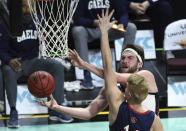 Gonzaga forward Drew Timme (2) lays up the ball against Saint Mary's the during the first half of an NCAA semifinal college basketball game at the West Coast Conference tournament Monday, March 8, 2021, in Las Vegas. (AP Photo/David Becker)