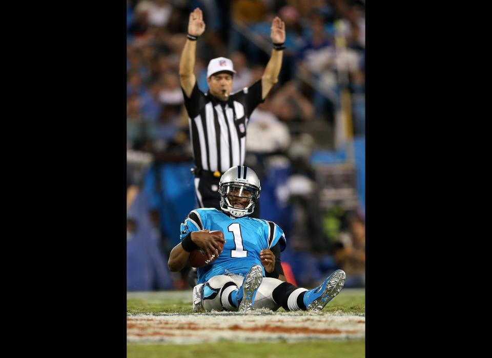 Cam Newton #1 of the Carolina Panthers reacts after he was sacked in the first half against the New York Giants at Bank of America Stadium on September 20, 2012 in Charlotte, North Carolina.  