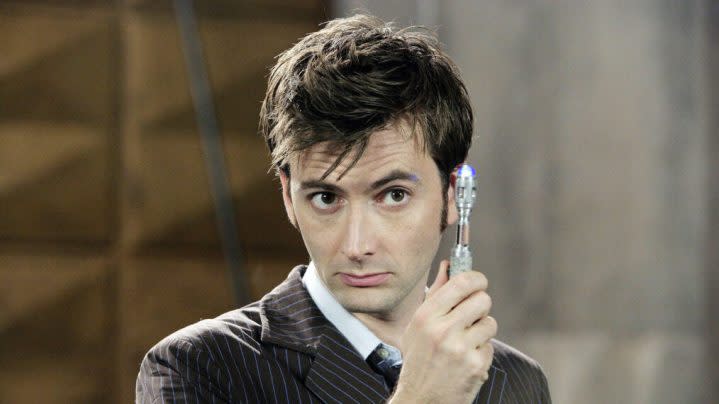 David Tennant as the Tenth Doctor brandishes his sonic screwdriver