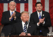 <p>U.S. Vice President Mike Pence (L) and Speaker of the House Paul Ryan (R) applaud as U.S. President Donald J. Trump (C) delivers his first address to a joint session of the U.S. Congress on February 28, 2017 in the House chamber of the U.S. Capitol in Washington, D.C. (Jim Lo Scalzo/Getty Images) </p>