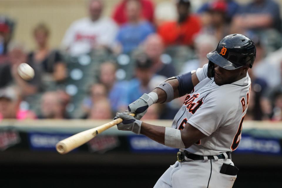 Tigers outfielder Akil Baddoo hits a solo home run against the Twins in the third inning of the Tigers' 6-5 win in 11 innings on Tuesday, July 27, 2021, in Minneapolis.