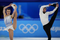 Ashley Cain-Gribble and Timothy Leduc, of the United States, compete in the pairs short program during the figure skating competition at the 2022 Winter Olympics, Friday, Feb. 18, 2022, in Beijing. (AP Photo/Natacha Pisarenko)