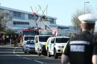 Police and fire services outside the Newsprinters printing works at Broxbourne, Hertfordshire, as protesters use bamboo lock-ons continue to block the road. (Photo by Yui Mok/PA Images via Getty Images)