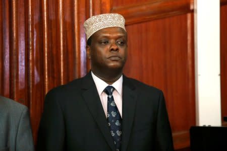 Hassan Wario, Kenya's ambassador to Austria and former sports minister stands in the dock during a hearing at the Mililani Law Court where he was charged with abuse of office and failure to comply with the law in Nairobi, Kenya, October 19, 2018. REUTERS/Baz Ratner