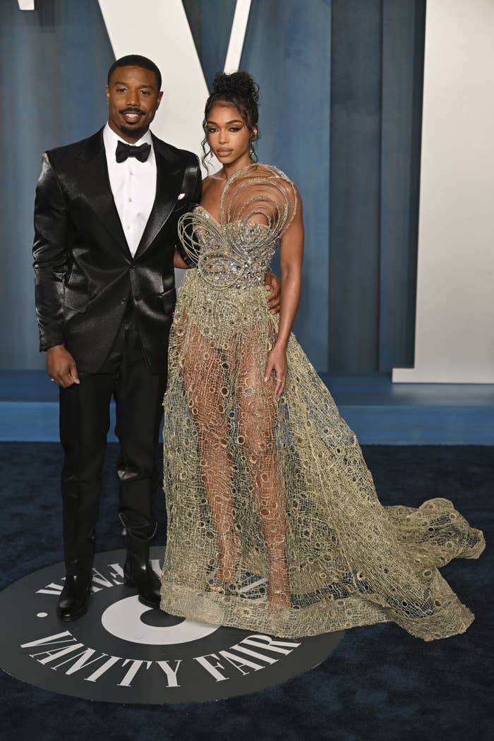 Michael and Lori pose for a photo at the Vanity Fair Oscar party