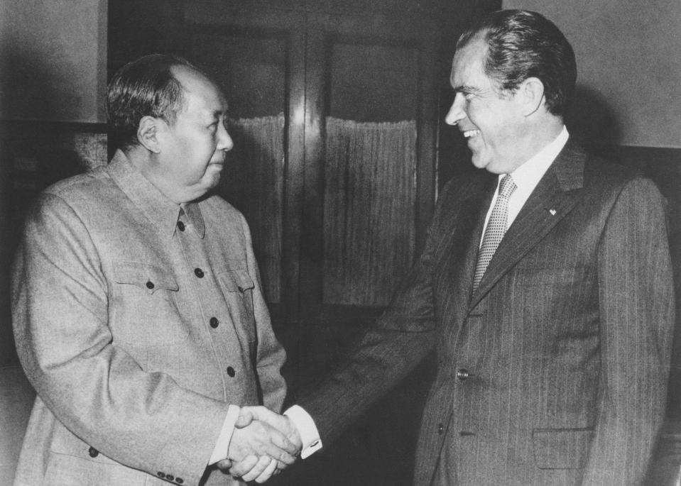 FILE - In this Feb. 21, 1972, file photo, Chinese communist party leader Mao Zedong, left, and U.S. President Richard Nixon shake hands as they meet in Beijing, China. Nixon made the historic journey to meet Chinese leader Mao Zedong in part paved by a U.S. pingpong delegation that traveled to Beijing a year earlier. Their historic handshake was as much about countering the Soviet threat as building trade and cordial relations between the two countries. (AP Photo, File)