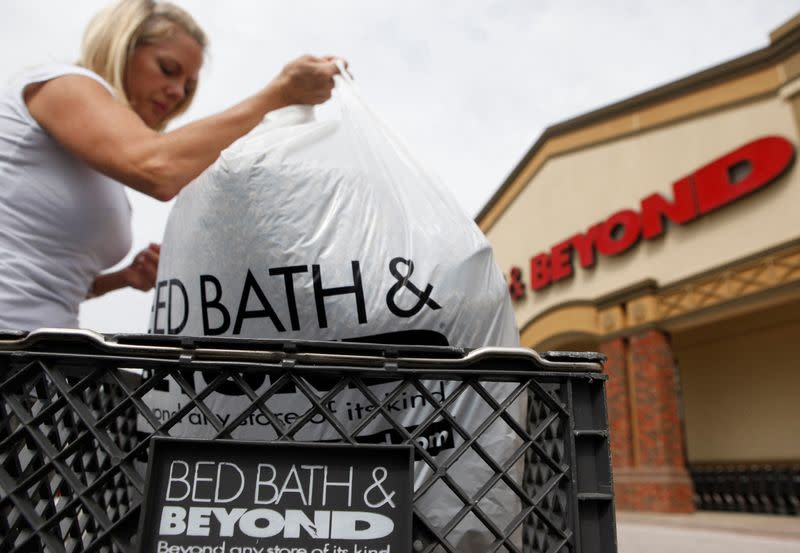 FILE PHOTO: Hammons unloads a bag of items she purchased at a Bed Bath & Beyond store in Dallas