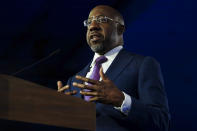 Democratic Sen. Raphael Warnock speaks during an election night watch party, Tuesday, Dec. 6, 2022, in Atlanta. Democratic Sen. Raphael Warnock has defeated Republican challenger Herschel Walker in a runoff election in Georgia. (AP Photo/John Bazemore)