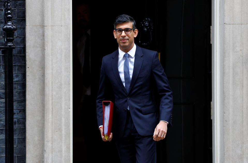 NFT British Prime Minister Rishi Sunak walks outside Number 10 Downing Street in London, Britain March 15, 2023. REUTERS/Peter Nicholls