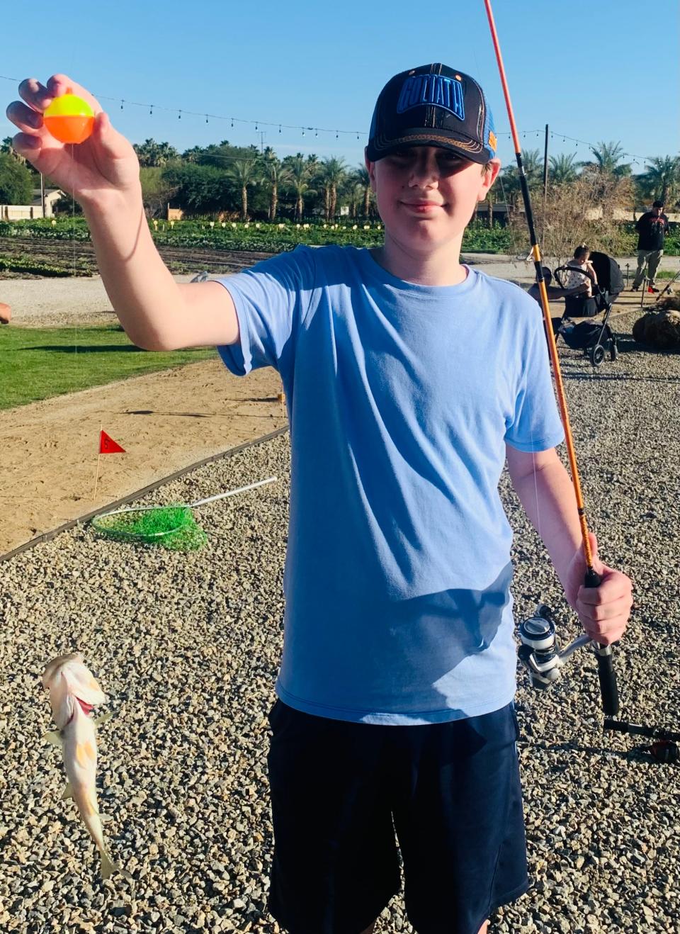 Samuel Magnuson catches a fish!