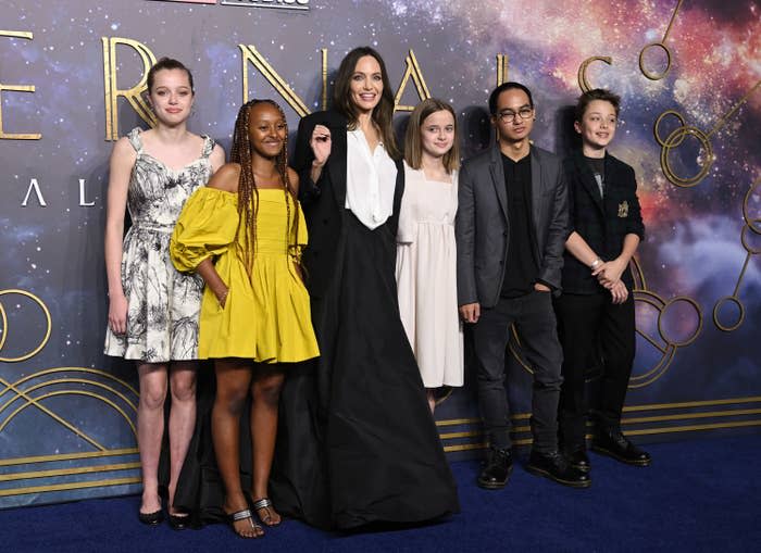 The family continued to make sustainable fashion statements, with Shiloh rocking a black-and-white Dior dress that Angelina originally wore two years ago, and Vivienne re-wearing her dress from Eternals' Los Angeles premiere.