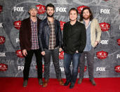 The Eli Young Band -- made up of Texans including (L-R) bassist Jon Jones, drummer Chris Thompson, singer Mike Eli, and guitarist James Young made their way down the red carpet in various shades of denim. The fellows were showered with nominations this year, including for Single of the Year: Group, Artist of the Year: Group, and Song of the Year for their tune “Even If It Breaks Your Heart.”